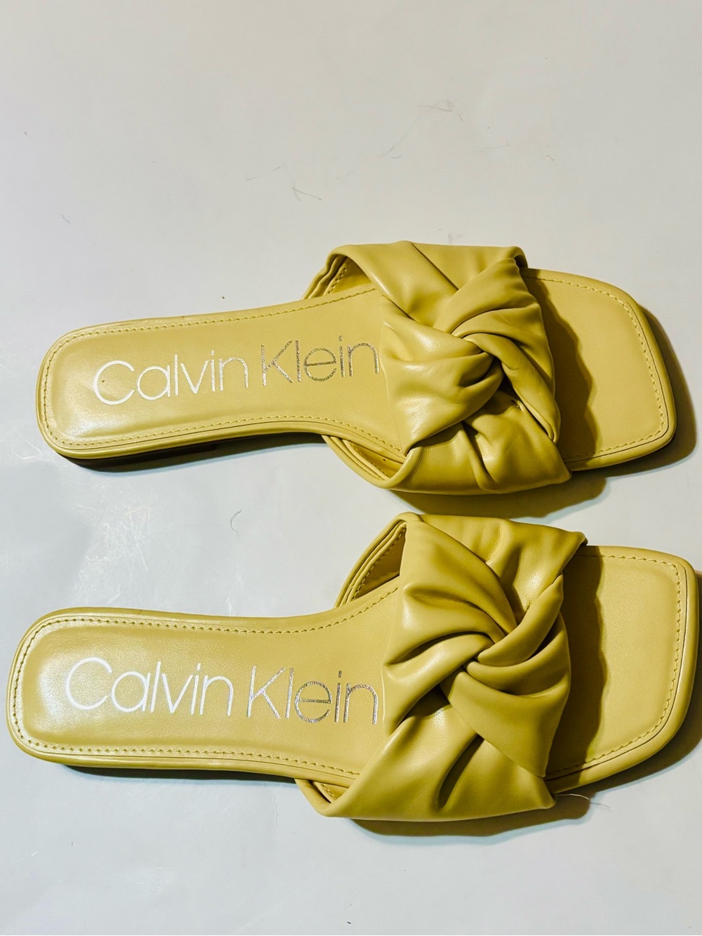 Calvin Klein Knot-Detail Slip-On Sandals in Lemon